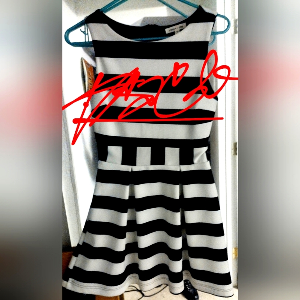 Black and White striped cocktail dress.